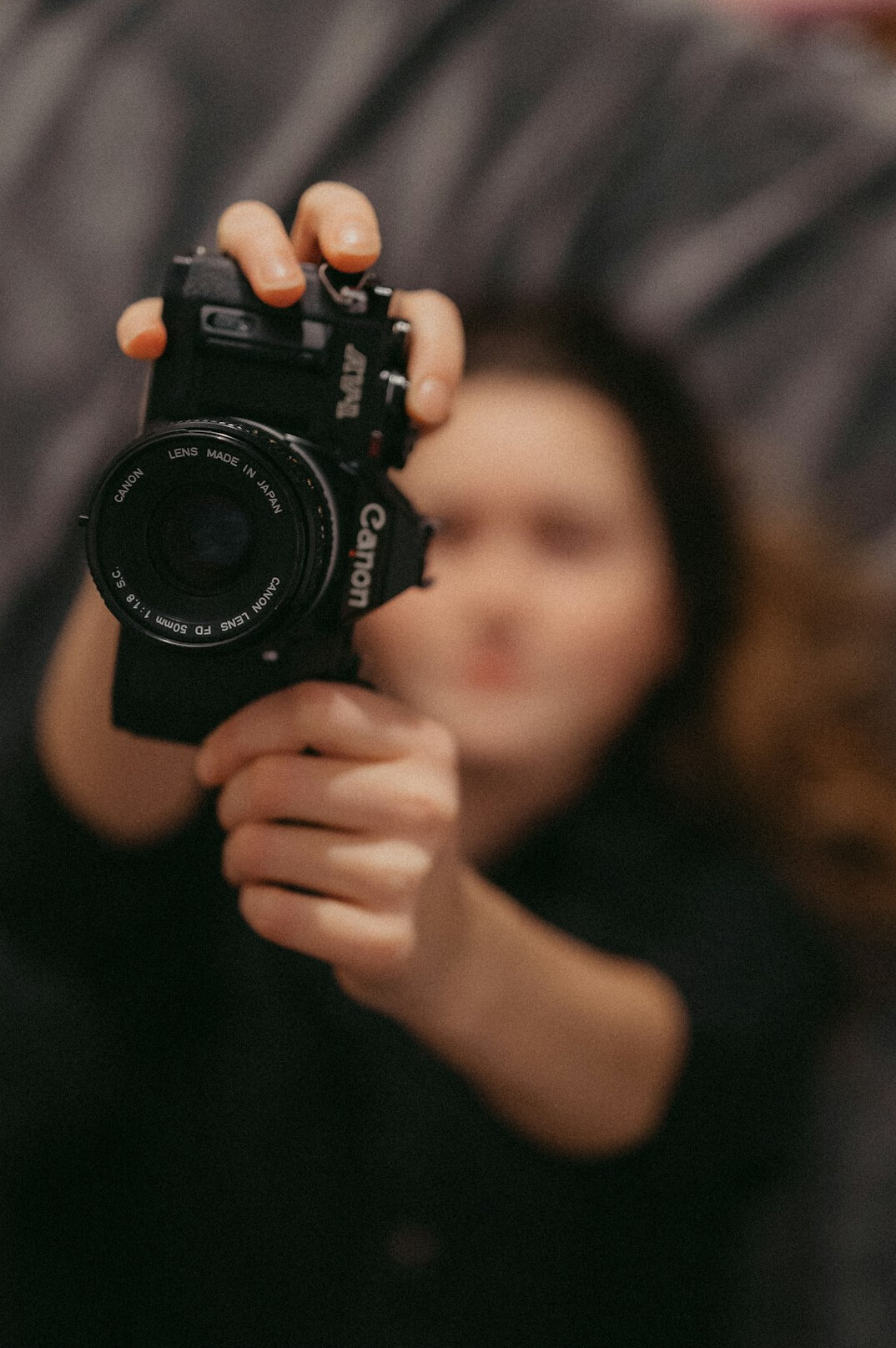 Portrait of a smiling woman camera tutor